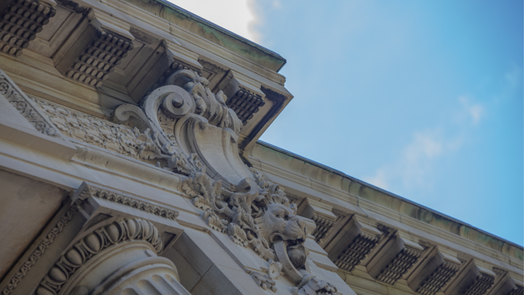 Seymour Library - facade with lion and a blue sky in the background