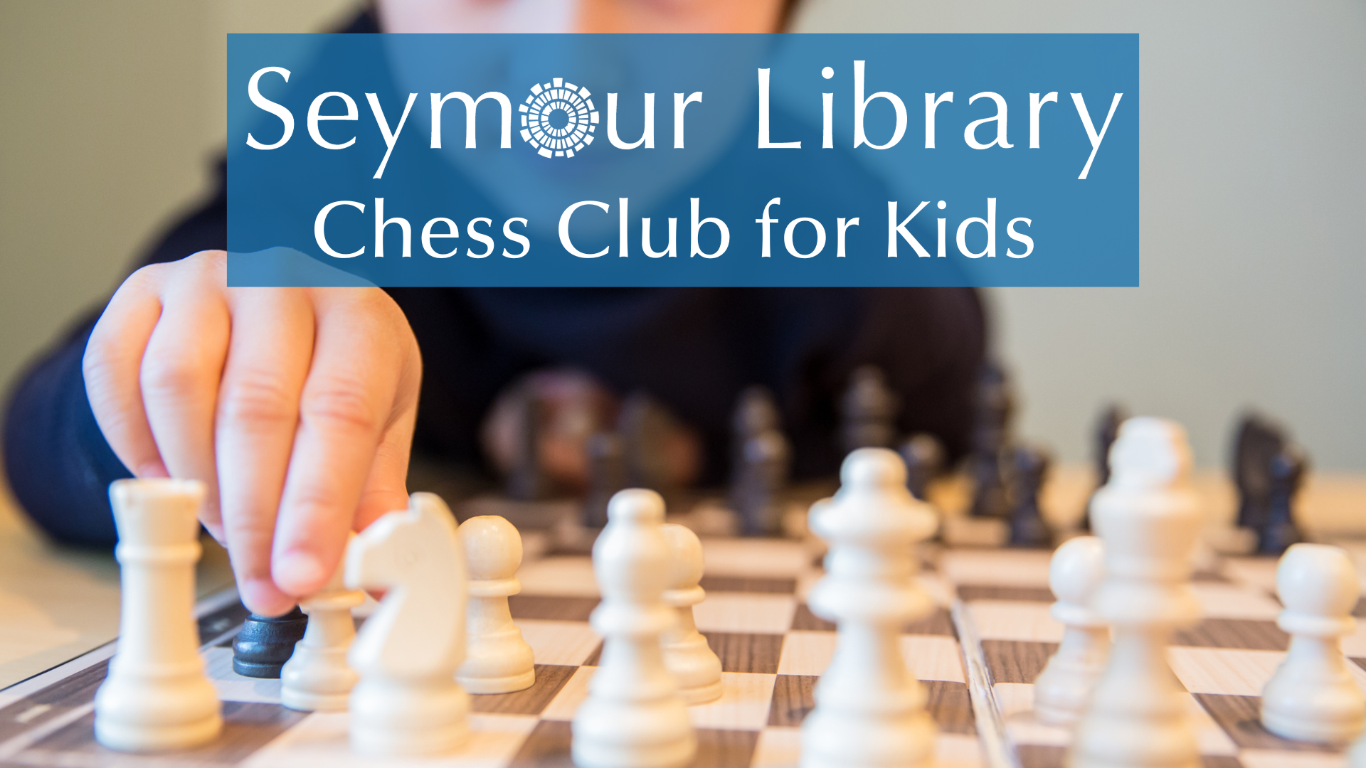 Chess Club for Kids at Seymour Library - image of child playing chess
